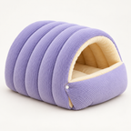 cave cat bed with padded interior in purple