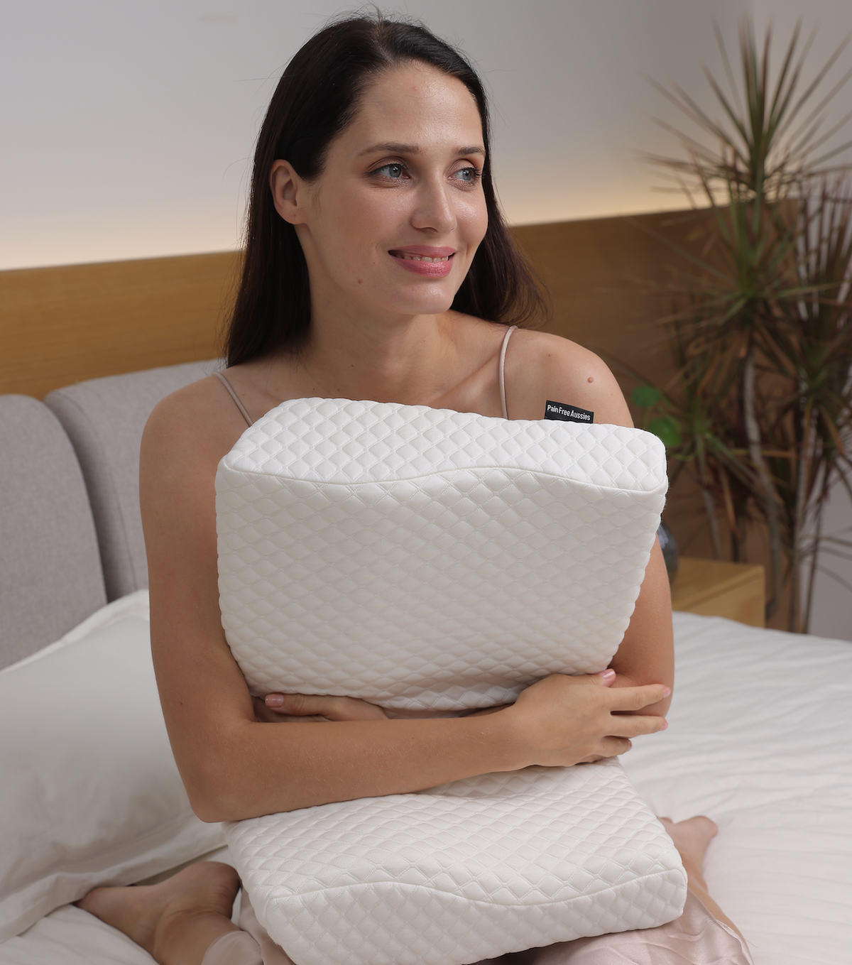 contoured neck support pillow in white