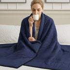 cool-touch quilted blanket in dark blue