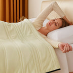 cool-touch quilted blanket in vanilla ice