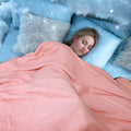cool-touch quilted blanket in pink
