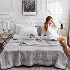 cool-touch quilted blanket in grey