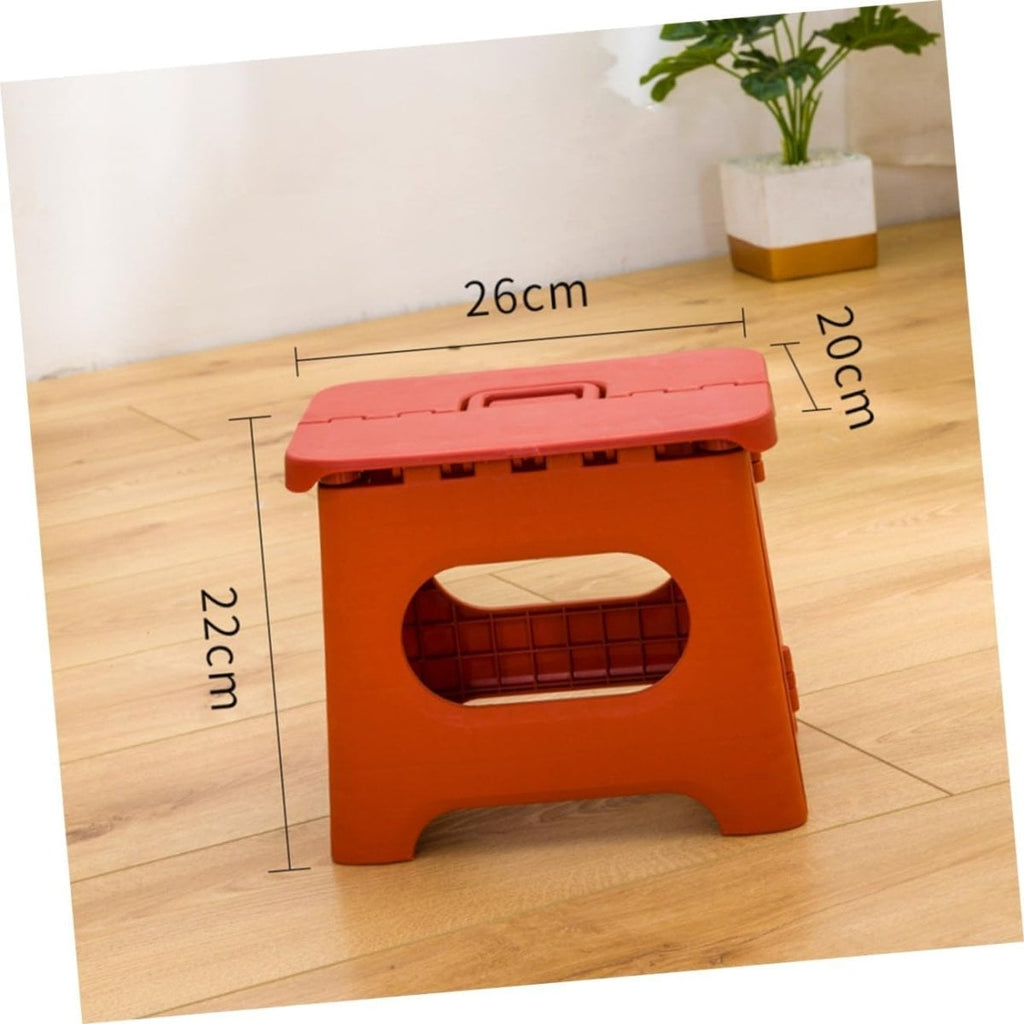 folding step stool with carry handle in dark orange
