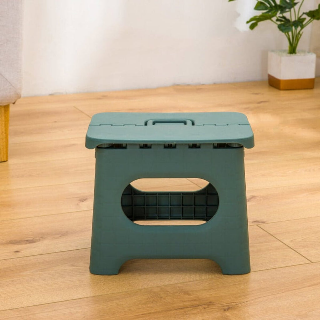 folding step stool with carry handle in green