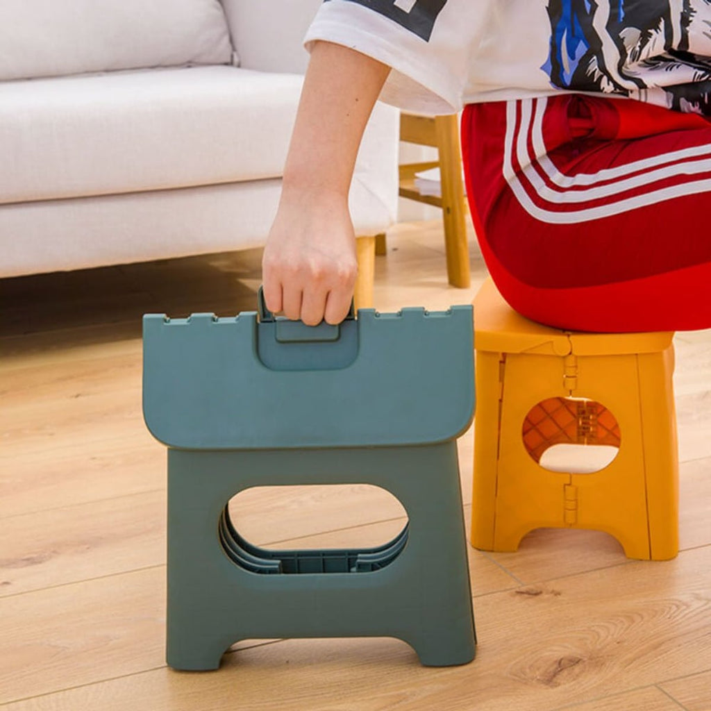 folding step stool with carry handle in green