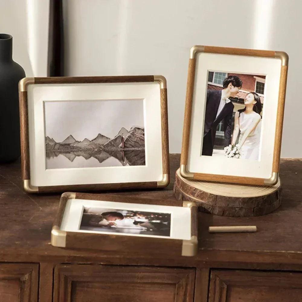 freestanding photo frame with gold corner detail