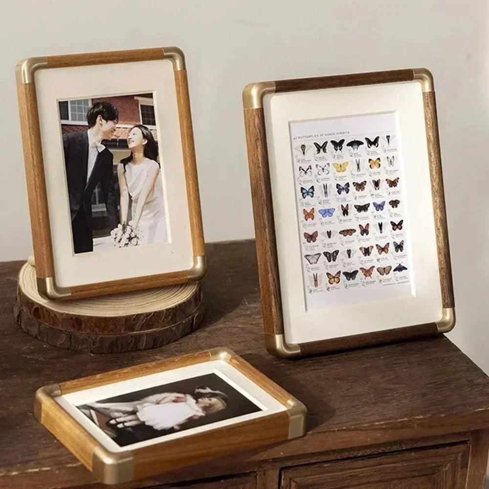 freestanding photo frame with gold corner detail