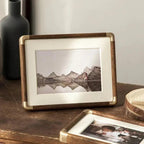 freestanding photo frame with gold corner detail