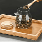 glass storage jar with spoon