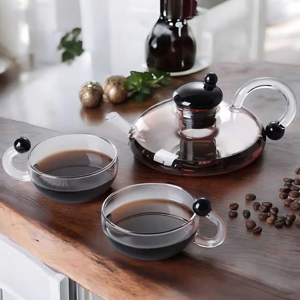 glass teapot set with cups in transparent