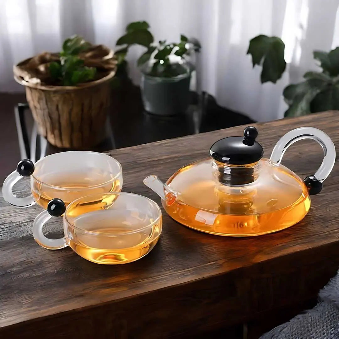 glass teapot set with cups in transparent