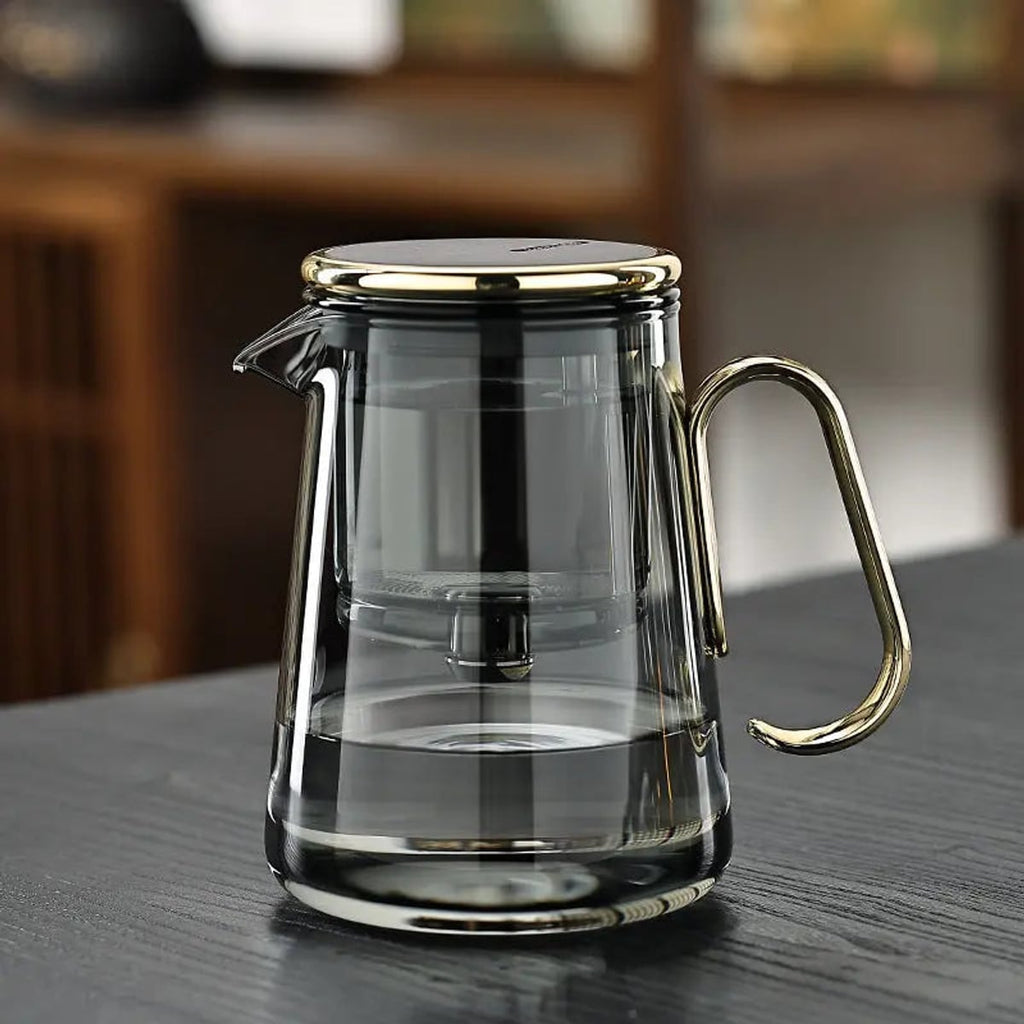 glass teapot with infuser and 4 cups in gold