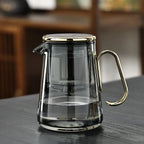 glass teapot with infuser and 4 cups in gold