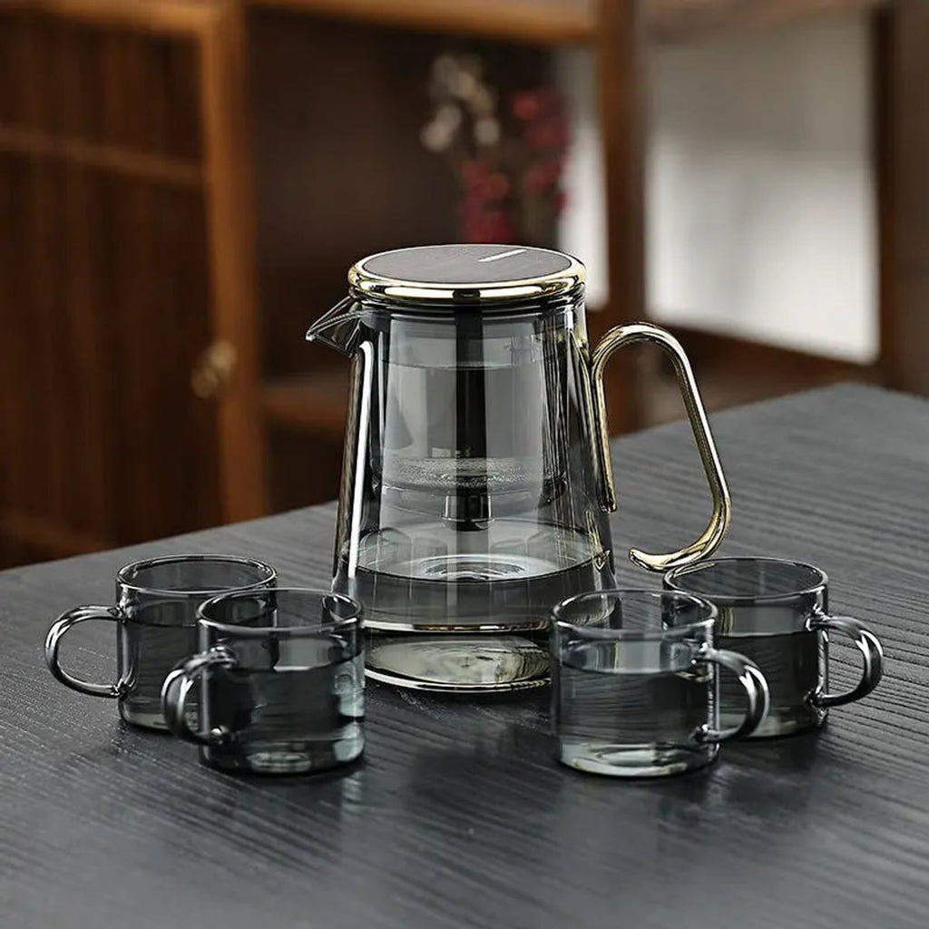glass teapot with infuser and 4 cups in gold