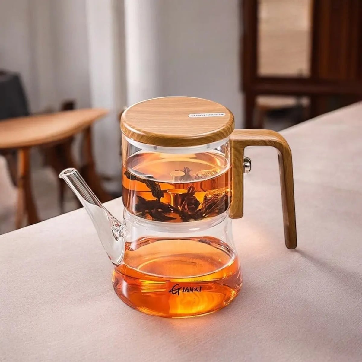 glass teapot with infuser and wooden handle