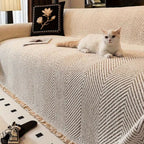 herringbone sofa cover with fringe trim in ivory sand