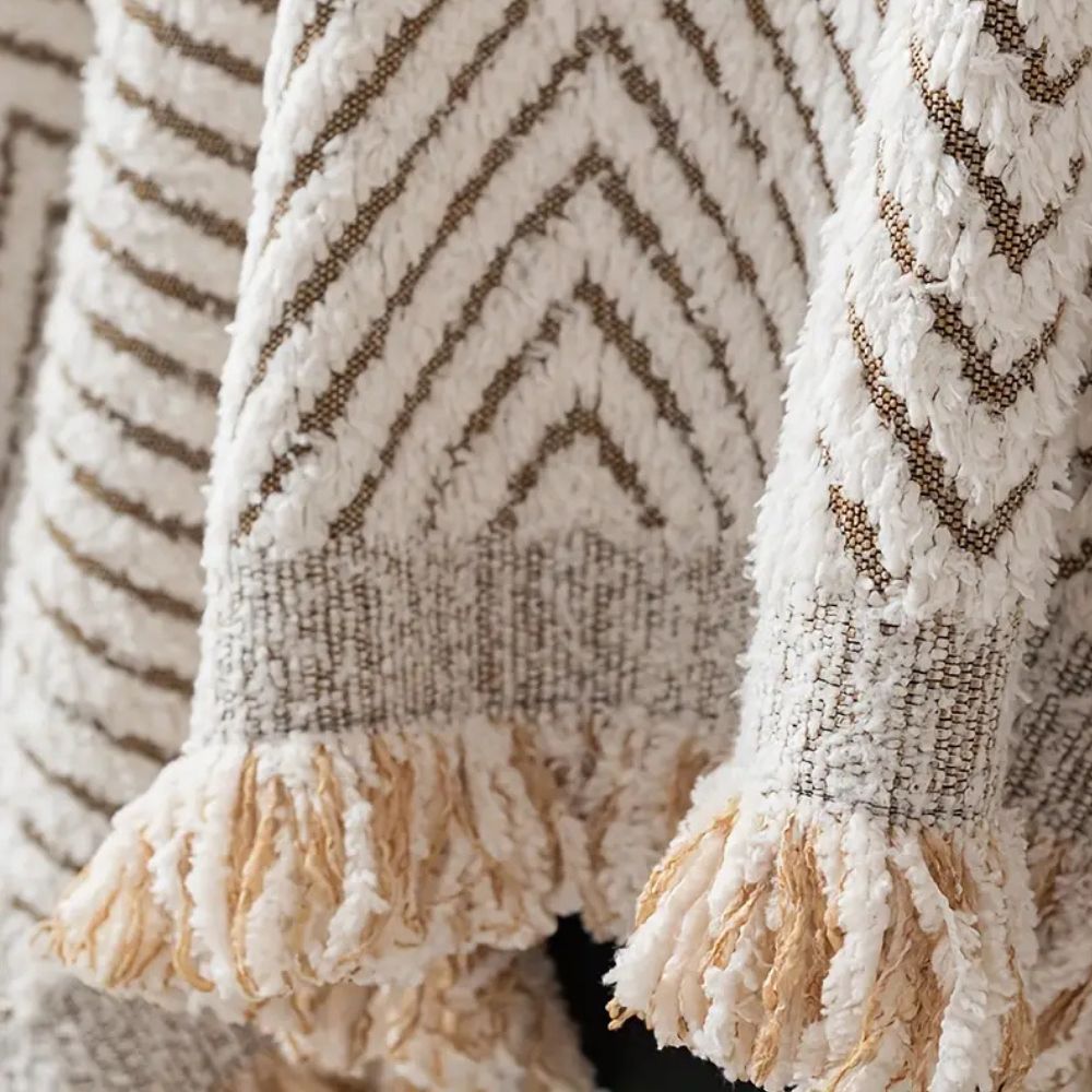 herringbone sofa cover with fringe trim in ivory sand