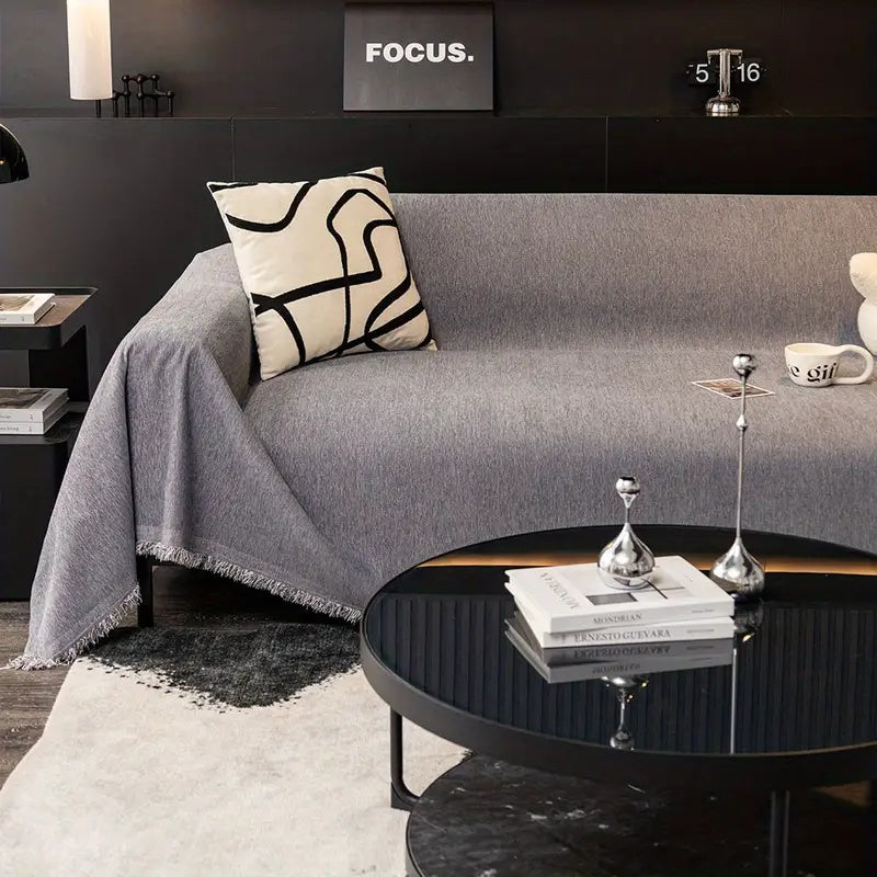 herringbone sofa cover with tassels in grey
