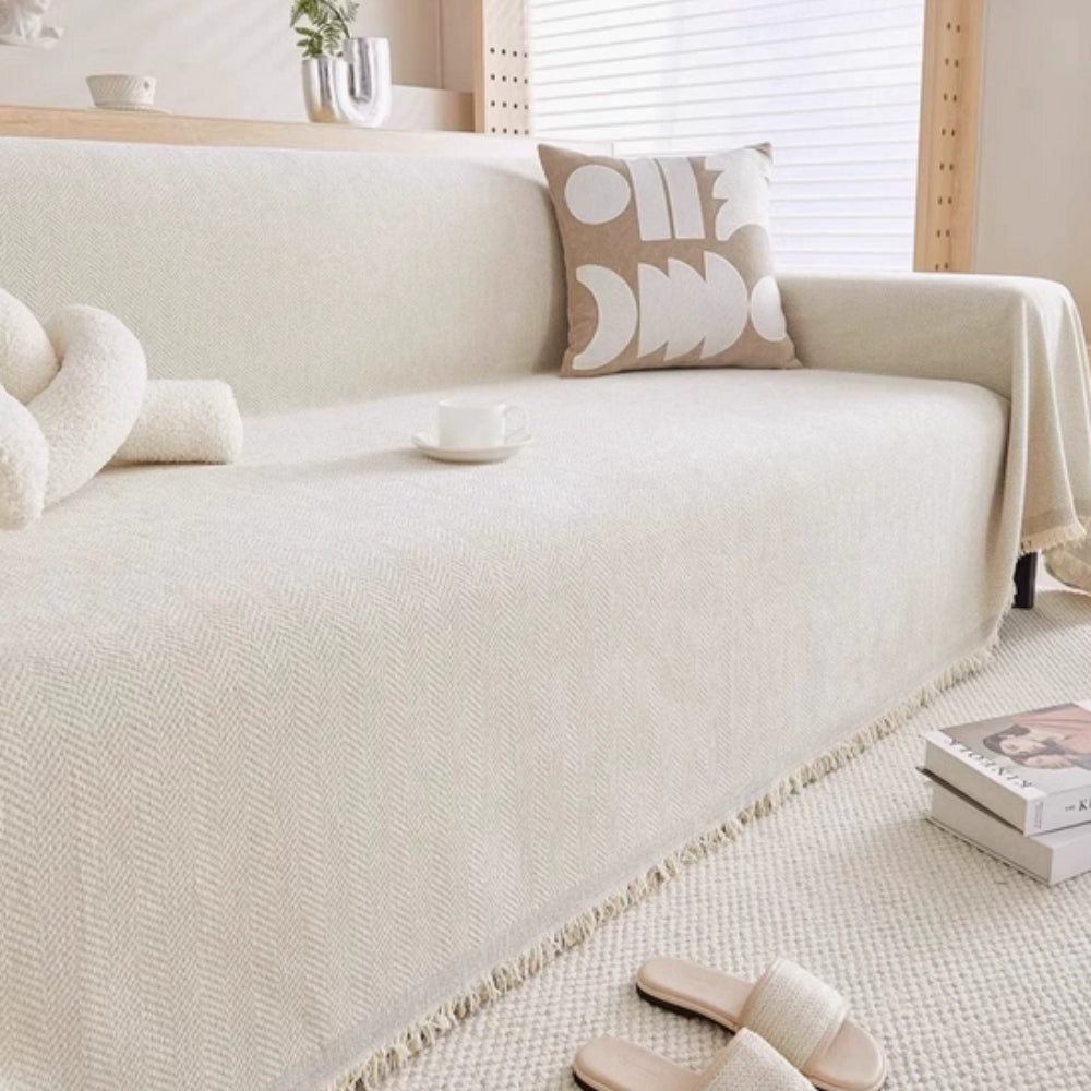 herringbone sofa cover with tassels in apricot