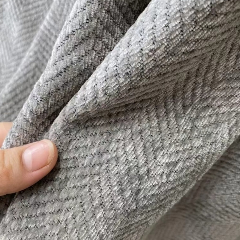 herringbone sofa cover with tassels in grey