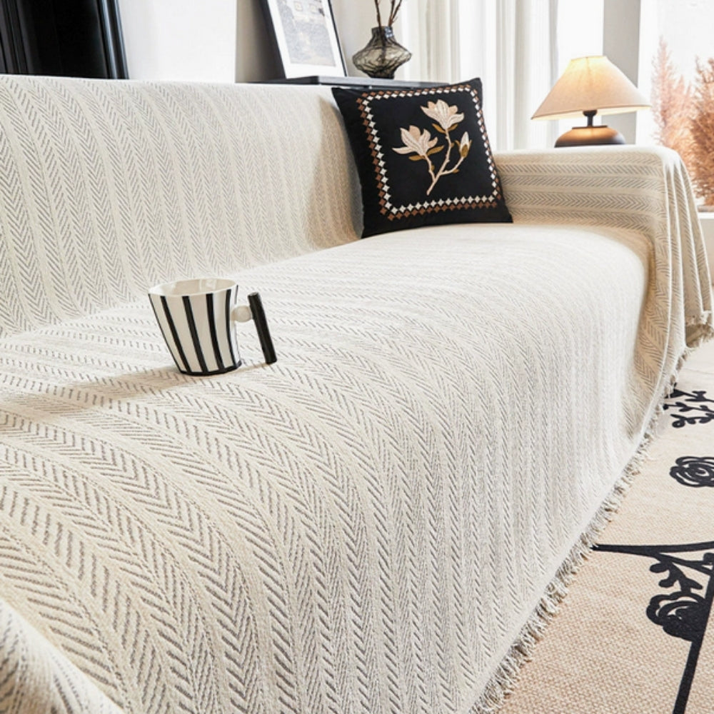 herringbone tassel sofa cover in light grey
