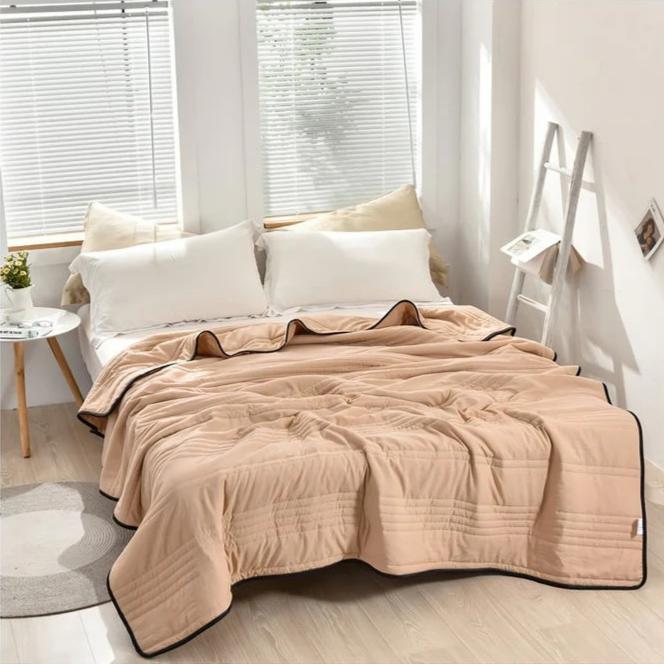 lightweight quilted cooling blanket in beige