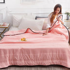 lightweight quilted cooling blanket in pink