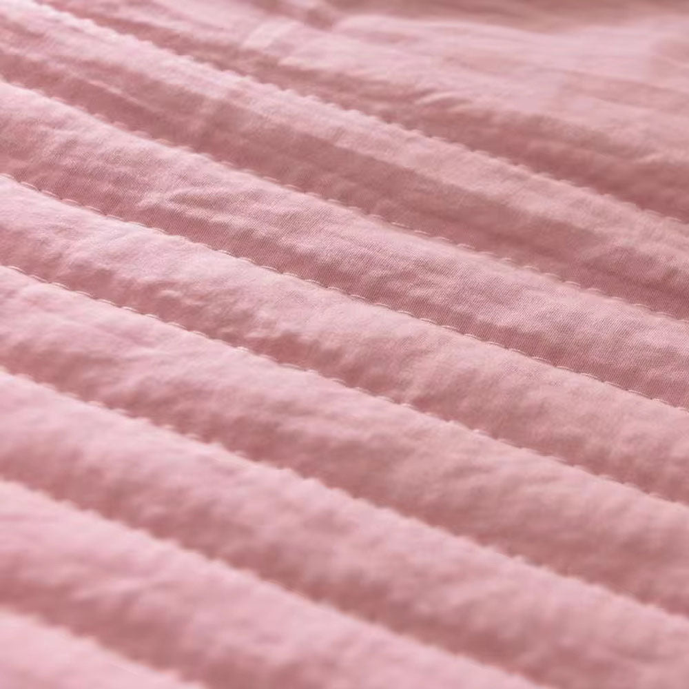 lightweight quilted cooling blanket in pink