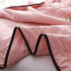 lightweight quilted cooling blanket in pink