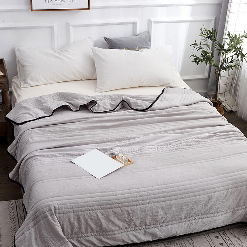 lightweight quilted cooling blanket in grey