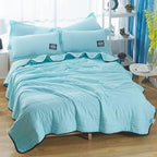 lightweight quilted cooling blanket in light blue