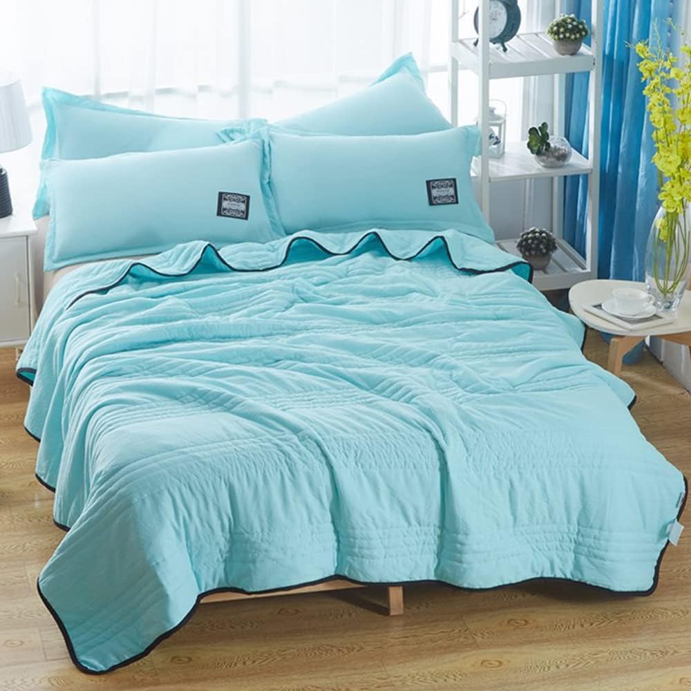 lightweight quilted cooling blanket in light blue
