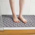 non-slip shower mat with drainage holes in grey