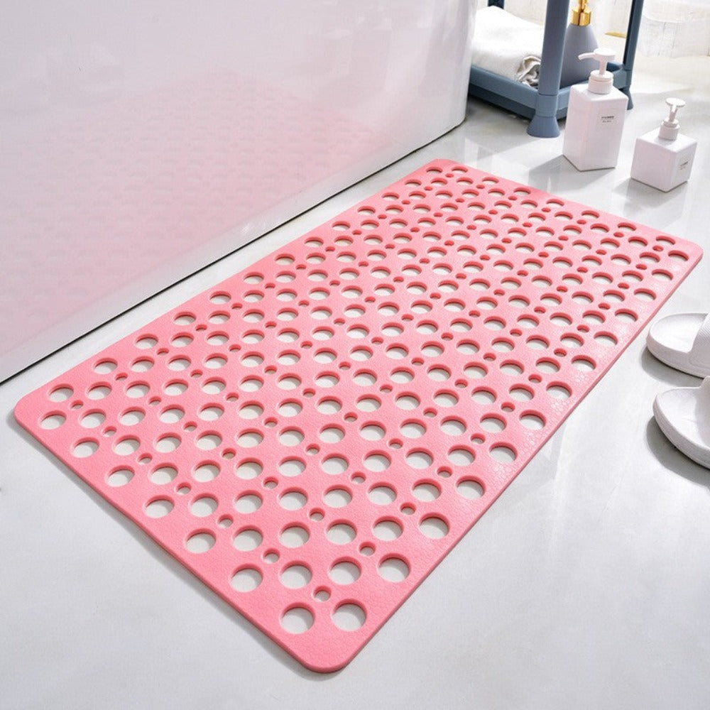 non-slip shower mat with drainage holes in pink