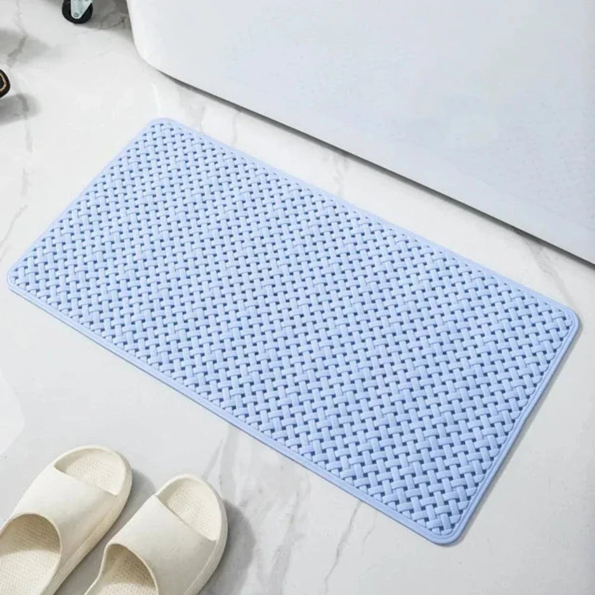 non-slip shower mat with suction cups in light blue
