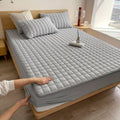 quilted fitted mattress protector in grey