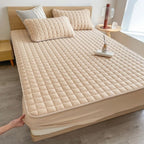 quilted fitted mattress protector in beige