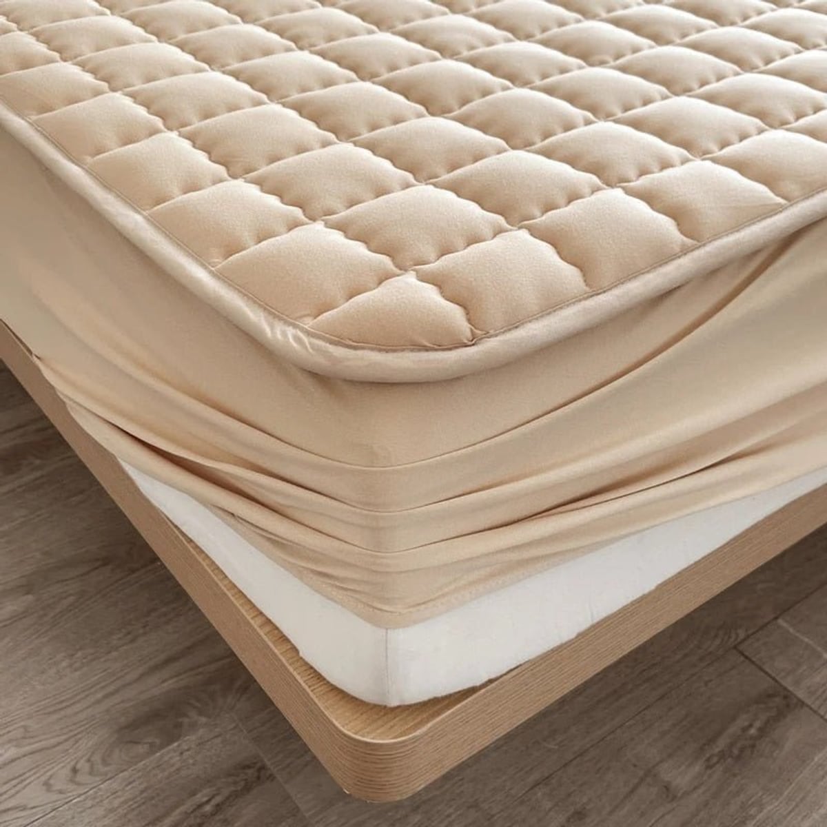 quilted fitted mattress protector in beige