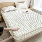 quilted fitted mattress protector in white