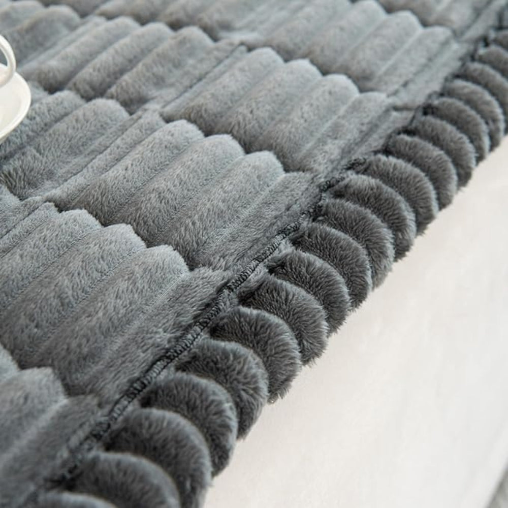 quilted plush sofa cover in charcoal calm
