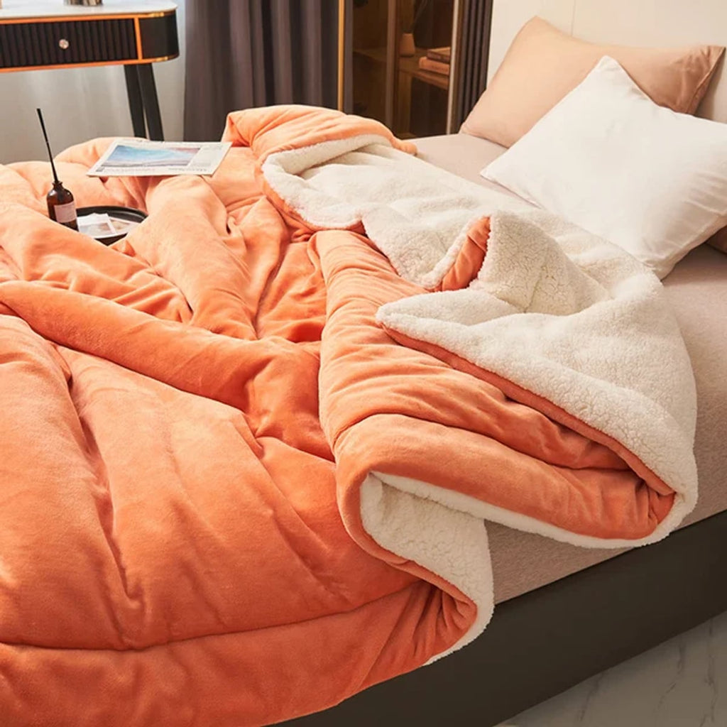 reversible fluffy throw blanket in orange