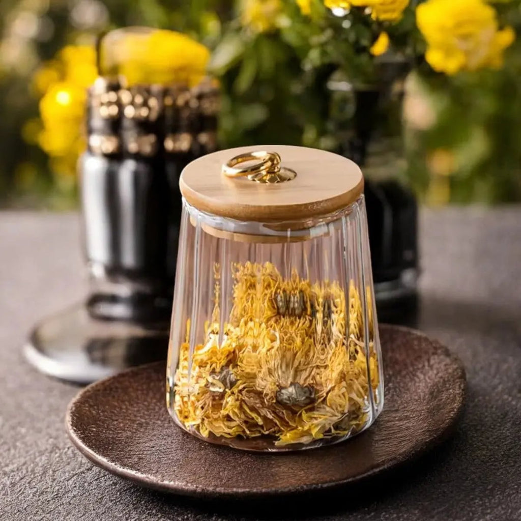 ribbed glass storage jar with wooden lid