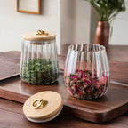 ribbed glass storage jar with wooden lid
