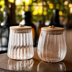 ribbed glass storage jar with wooden lid