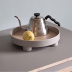 round footed decorative tray in grey