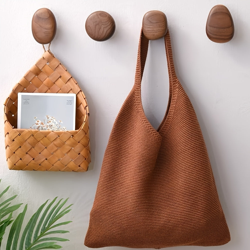 round wall-mounted pebble hooks in walnut