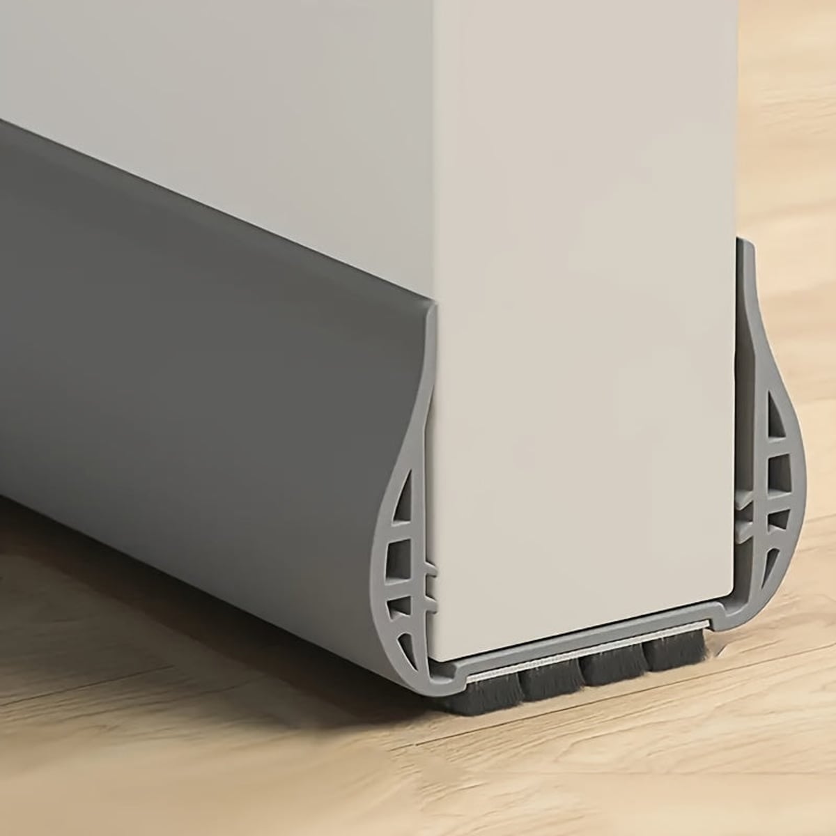 under-door draft excluder with brush strip in gray