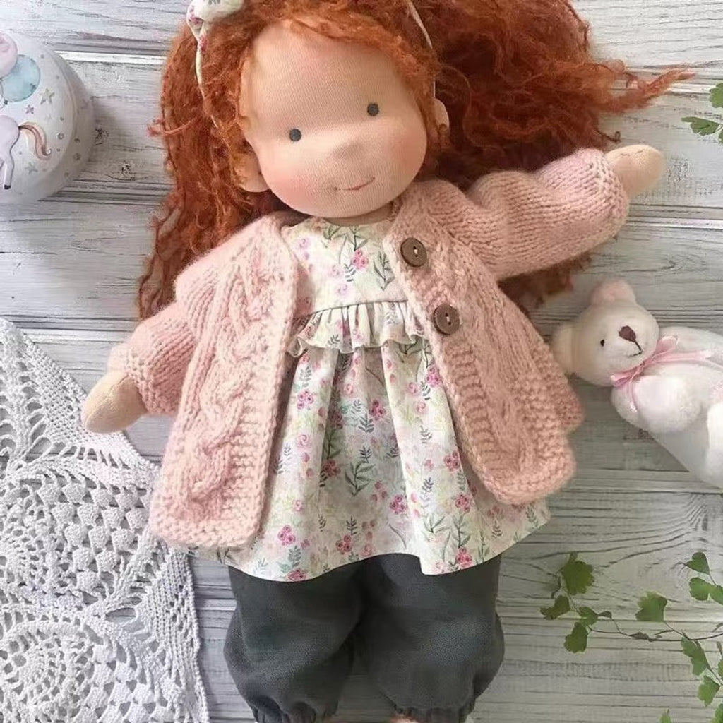 waldorf doll with knitted outfit and gentle animal companion