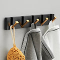 wall-mounted folding hook rail in gold