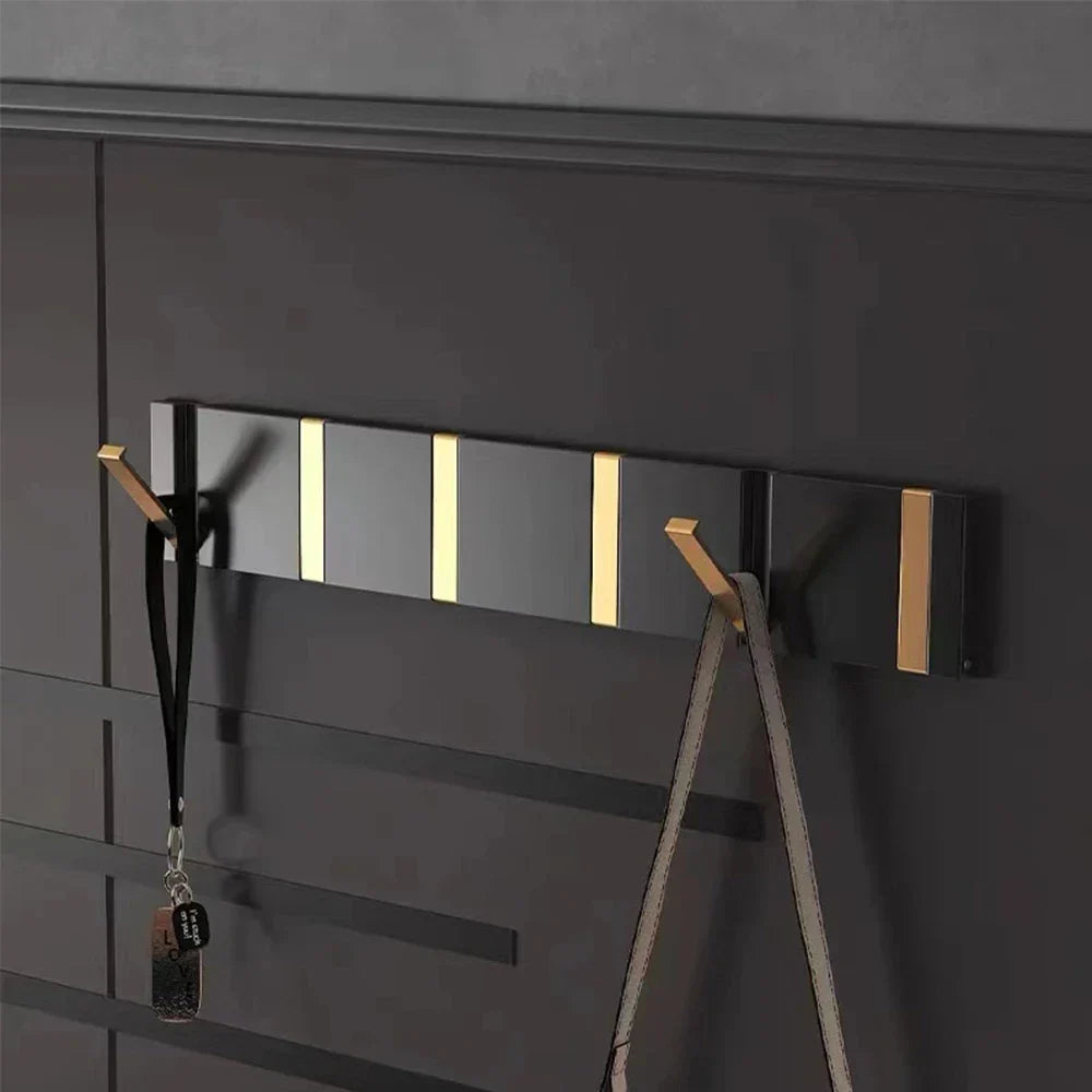 wall-mounted folding hook rail in gold